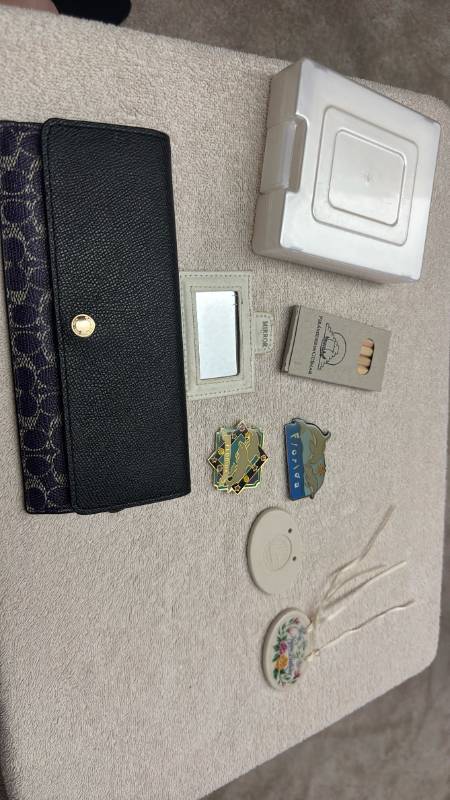 lot 1538 image: Coach wallet, Longaberger charms and more