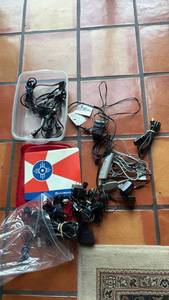 lot 1299 image: Various power supply cords with Wichita mouse pad and Rubbermaid tote