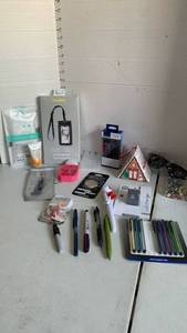 lot 3466 image: Phone grip, phone case, stylus, earbuds, pens, charger and more