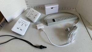 lot 3472 image: Power strip and adapters
