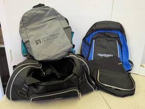 lot 3501 image: Lot of Bags FlightSafety Backpack, Incase Laptop Sleeve, Duffel, Backpack
