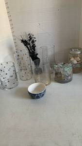 lot 3606 image: Glass candle holders with seashells and rocks