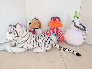 lot 3708 image: Lot of 4 Plush Toys Elmo White Tiger Dog Pajama Character and Snowman Figure