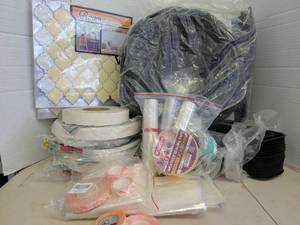 lot 3816 image: Assorted Lot Room Decor Wall Tiles, XFasten Weather Sealing Tape 2in x 30 Yd, Frost King Tape, and rubber stripping