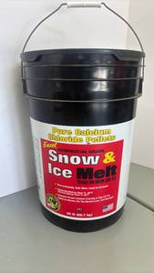 lot 4420 image: Excel Snow & Ice Melt Calcium Chloride Pellets 50 lb half full