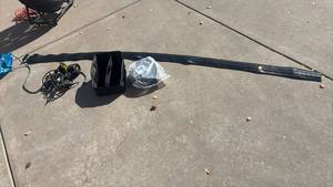lot 4423 image: 2 Garage Door Bottom Seal 20 Ft, Laser Light Projectors, Outdoor Timer, Fabric Bin