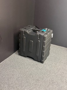 lot 28 image: Gator Pro Series Rack Case with Samson Servo 1200 Amplifier located in basement
