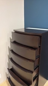 lot 26 image: 6 drawer chest of drawers Frosted Glass Top Inset, Dark Brown Finish 58 x 28 x 24 located in basement
