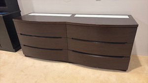 lot 25 image: 6 drawer dresser with Frosted Glass Top Inset, Dark Brown Finish 32 x 78 x 24 located in basement