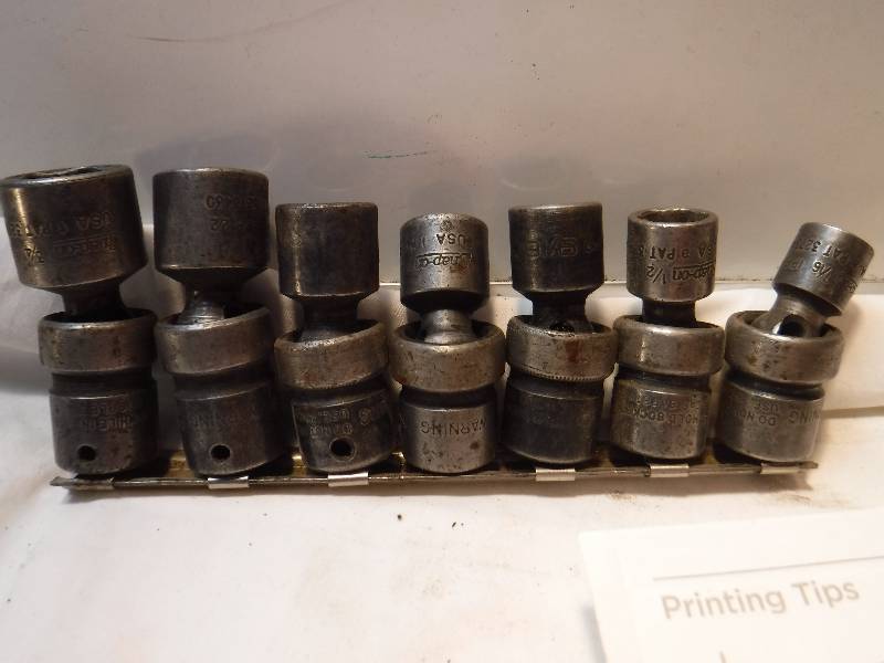 lot 1102 image: 7 Snap On Swivel sockets 38 drive