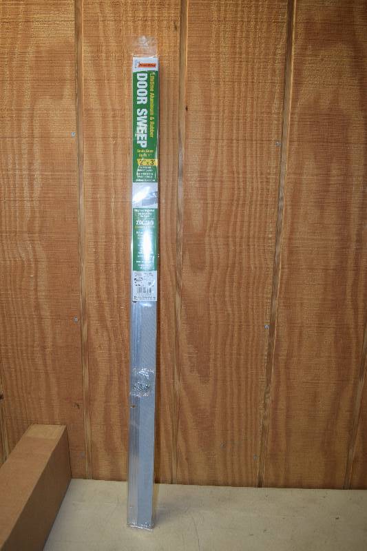 lot 45 image: 12 Frost King Door Sweeps