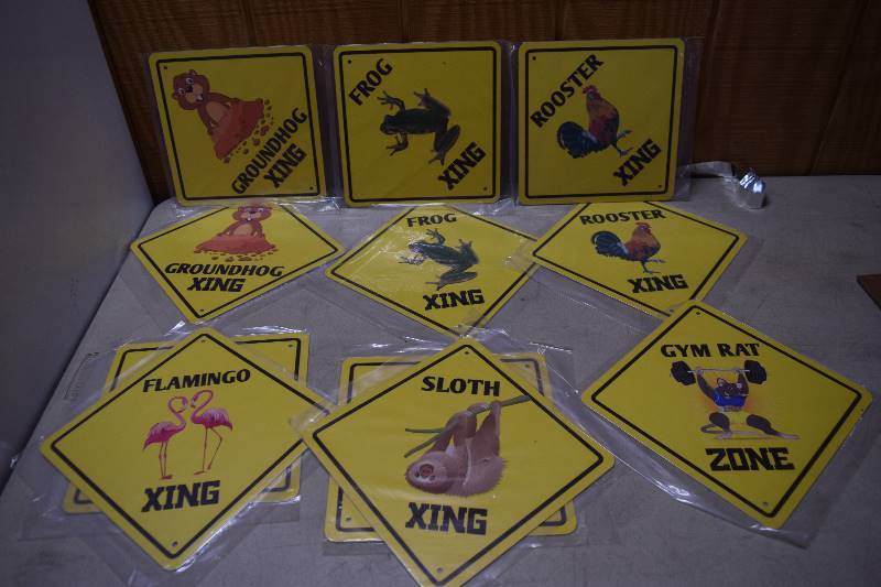 lot 80 image: 11 Metal Xing Signs