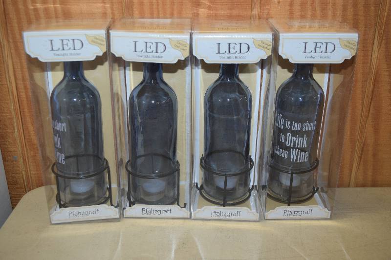 lot 273 image: 4 Pfaltzgraff LED Tealight Wine Bottles