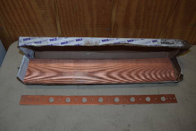 lot 400 image: 50 Holdrite 12 x 20 Copper Pipe Brackets