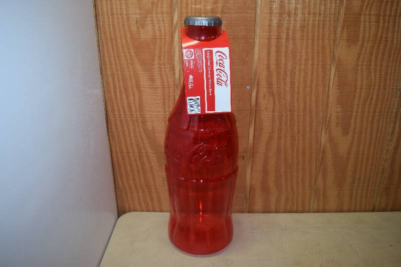 lot 467 image: Large Coca-Cola Bottle Bank