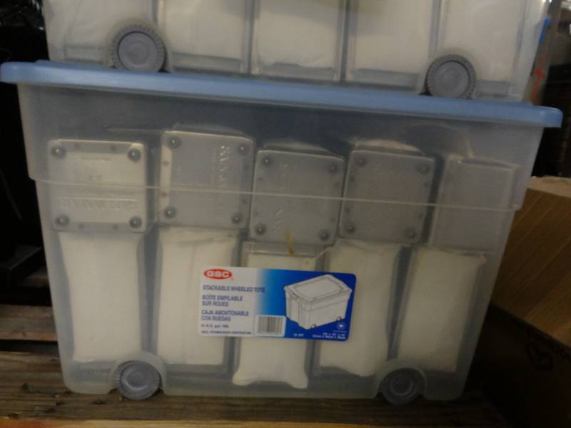 lot 9356 image: 2 Totes of Metal Napkin Dispensers, Tote of Baskets and Basket Liners, Plastic Silverware Dispensers