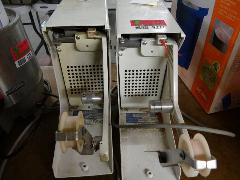 lot 9377 image: Plastic Bag Closer One Works, One As Is Model # 110-501 115V