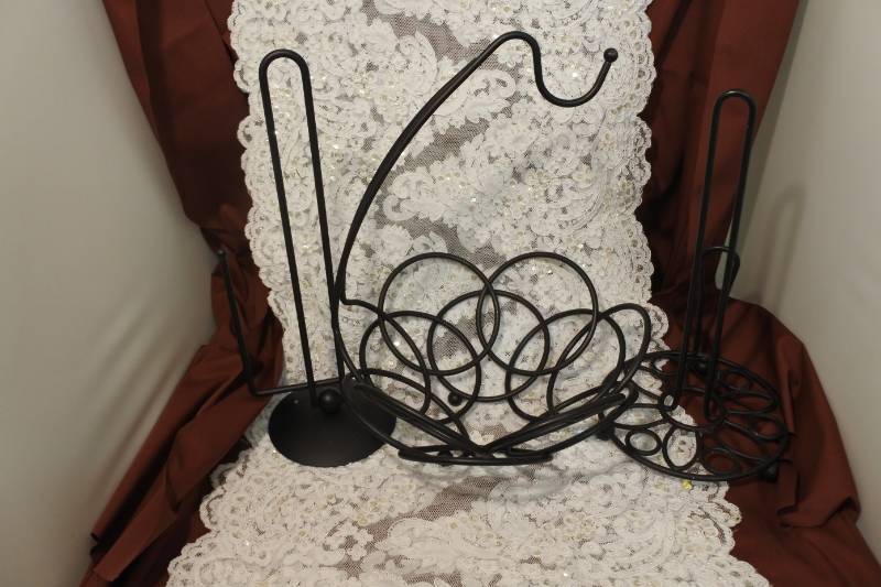 lot 3029 image: 2 Decorative Black Paper Towel Holders and Black Decorative Fruit Banana Hammock Holder