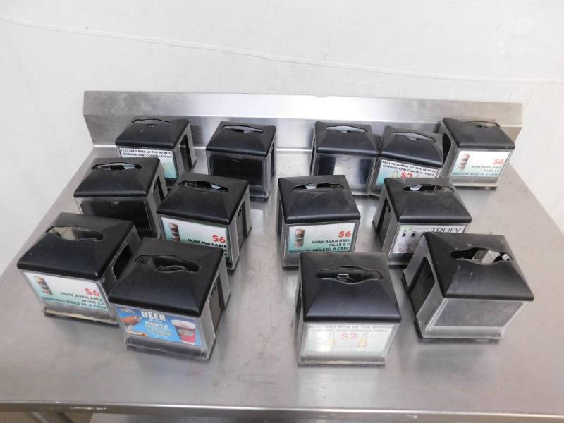 lot 2599 image: 13 Tork Plastic Napkin Dispensers