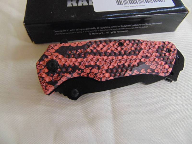 lot 3343 image: Spring assist pocket knife - Snakeskin Pattern -&nbsp NIB