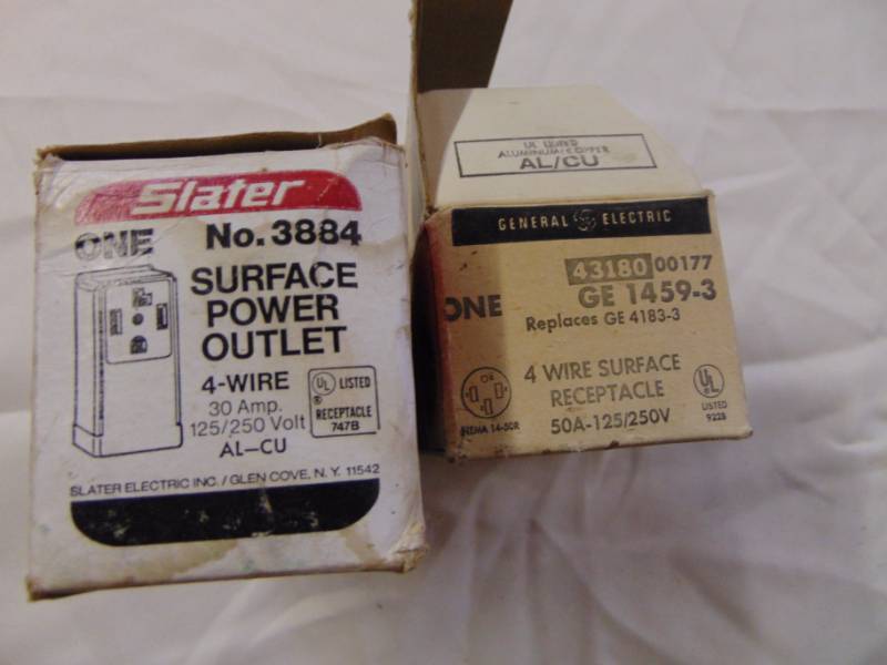 lot 3439 image: TWO SURFACE MOUNT RECEPTACLES- BROWN (ONE COVER DAMAGED)