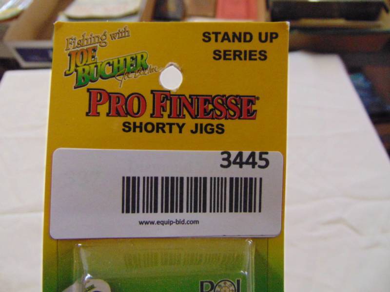 lot 3445 image: ORANGE FISHING JIGS SET