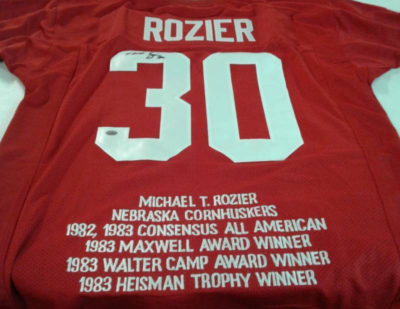 lot 1011 image: Singed Mike Rozier Nebraska Cornhuskers Stat Jersey Heisman Trophy Winner With GTSM Certificate of Authenticity