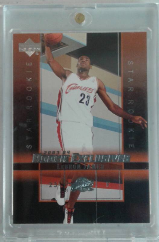 lot 1026 image: 2003-04 Upper Deck Exclusives LeBron James Rookie Card #1 in Magnetic Holder