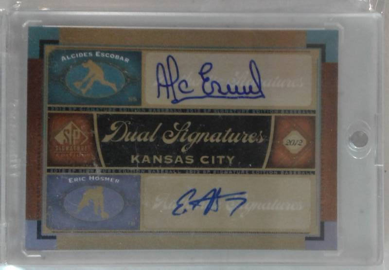 lot 1028 image: 2012 Upper Deck SP Signature Eric Hosmer & Alcides Escobar Dual Autographed Baseball Card in Magnetic Holder