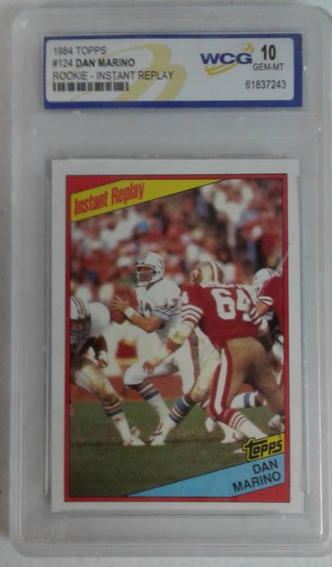 lot 1076 image: Professionally Graded 1984 Topps Dan Marino Rookie Year In Action Football Card
