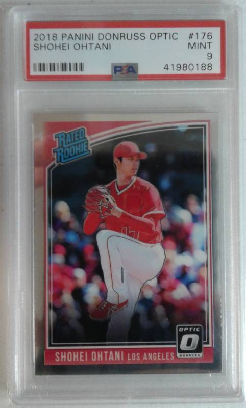 lot 1089 image: PSA 9 Mint 2018 Donruss Optic Shohei Ohtani Rated Rookie Angels Rookie of the Year