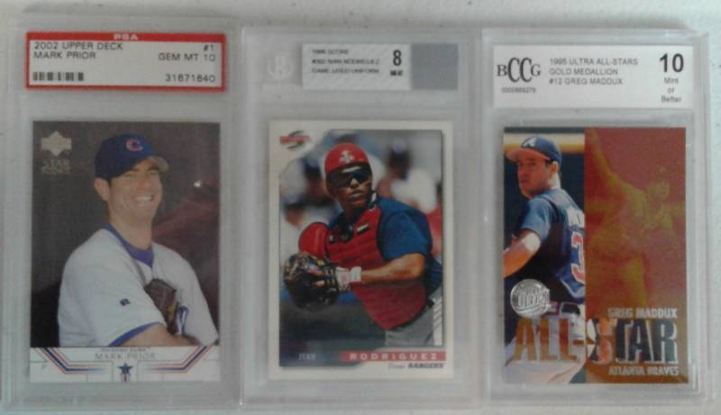 lot 1096 image: Three Card Lot Professionally Graded Cards - Only Beckett and PSA with Game Used Pudge Piece, Maddux Insert, PSA 10 Prior Rookie
