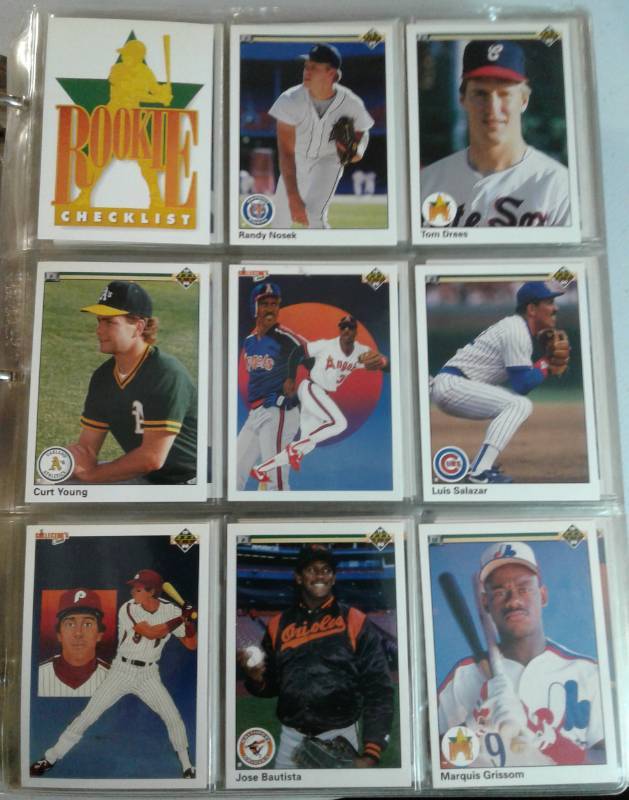lot 1111 image: Complete Mint 1990 Upper Deck 800 Card Baseball Card Set with Rookies of Sammy Sosa & Deion Sanders in Nice Binder
