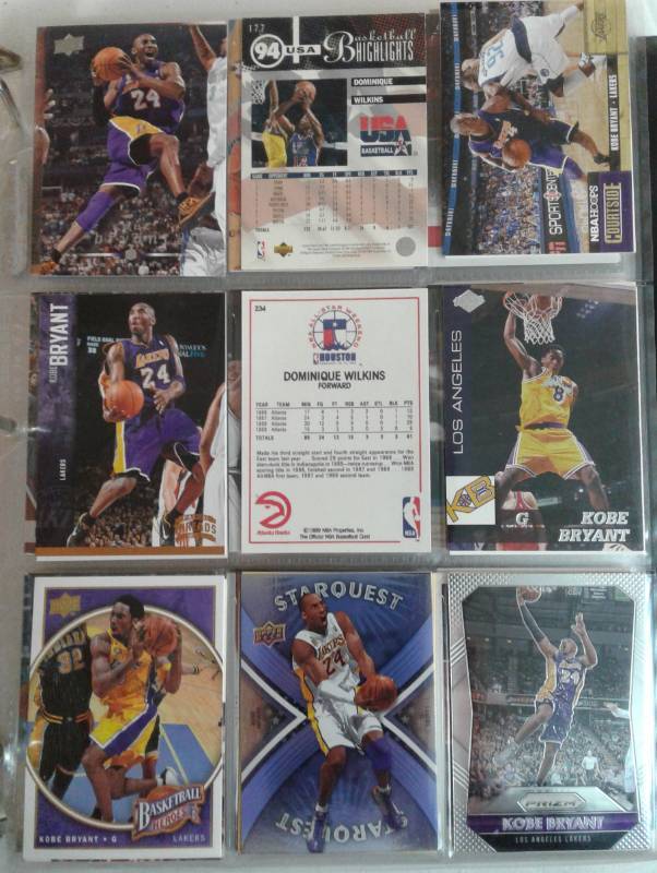 lot 1115 image: Binder Full of Basketball Cards Loaded With Hundreds of Stars - Michael Jordan, Shaq, Kobe, Bird, Dr. J, Pretty much Everyone