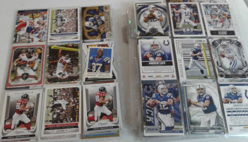 lot 1116 image: Random Assortment of Hundreds of NFL Trading Cards Loaded With Stars, Inserts, Refractors & Rookies Like Andrew Luck, Aaron Rodgers & More