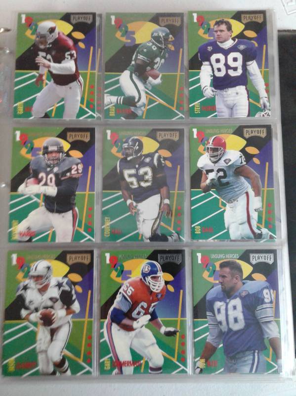 lot 1118 image: Complete 1995 Playoff Football Card Set With Playoff Prime Partial Set & Unsung Heroes Partial Insert Set In Nice Binder