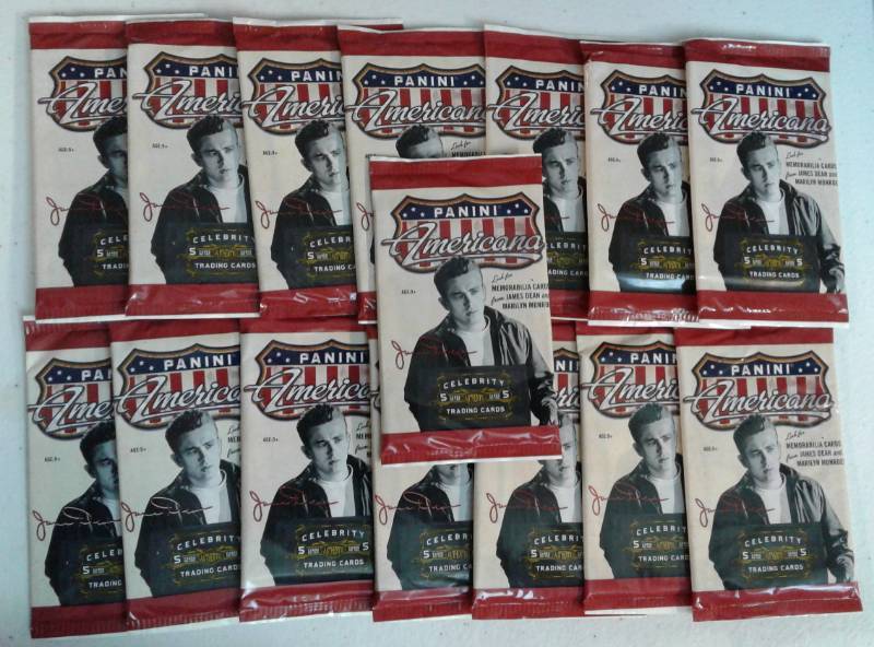lot 1031 image: Lot of Fifteen Sealed Packs of 2011 Panini Americana With Possible Relics & Autographs - James Dean & Marilyn Monroe Possible
