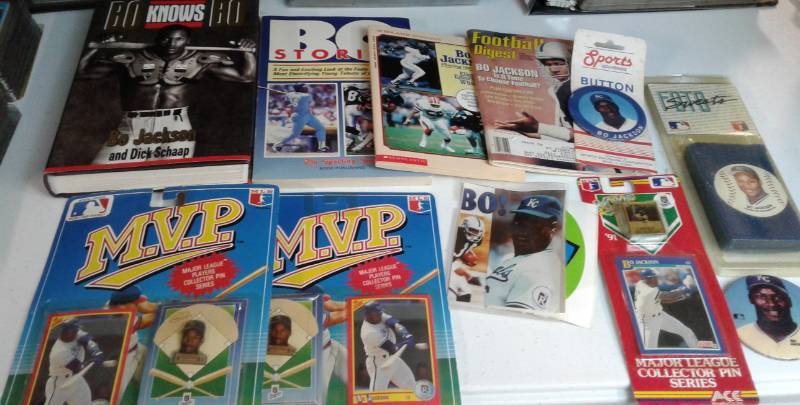 lot 1047 image: Huge Lot of Bo Jackson Pieces Including Buttons, Books, Magazines, and Bo Knows Bo Hardback Book