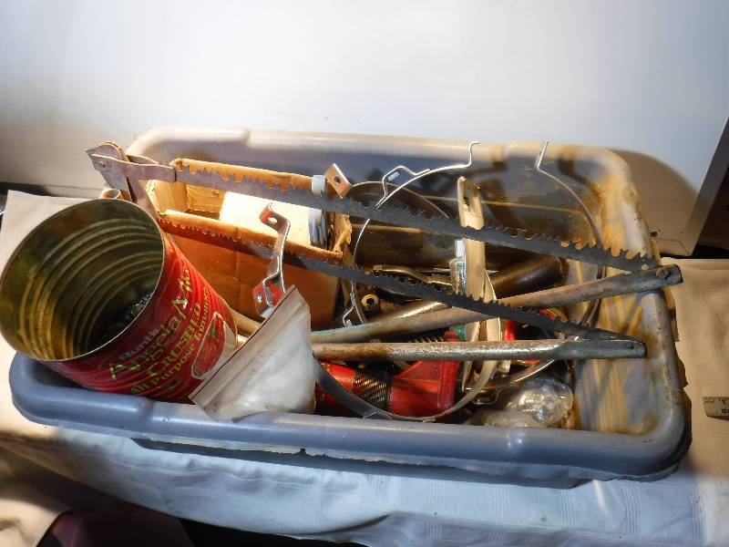 lot 7376 image: Hack saw and tote full of goodies