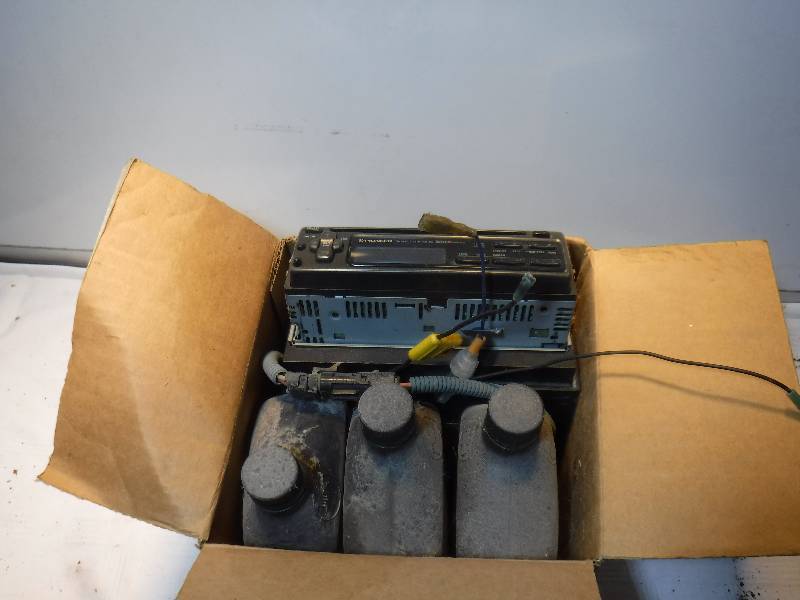 lot 7379 image: Pioneer car stereo and power steering fluid