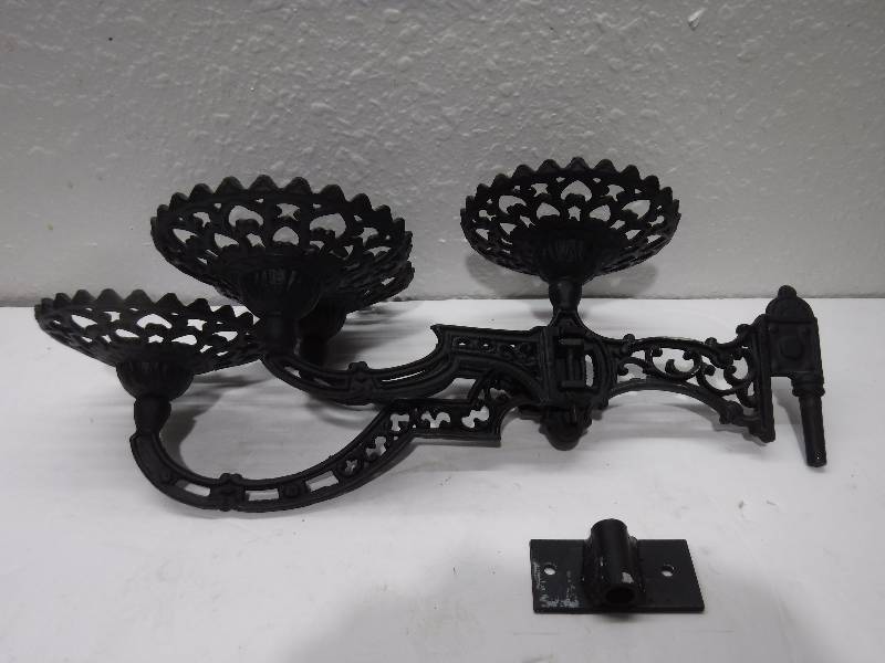 lot 7164 image: cast iron candle holder with wall mount bracket