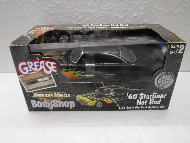 lot 7178 image: Ertl Grease 60s starliner scale activity set