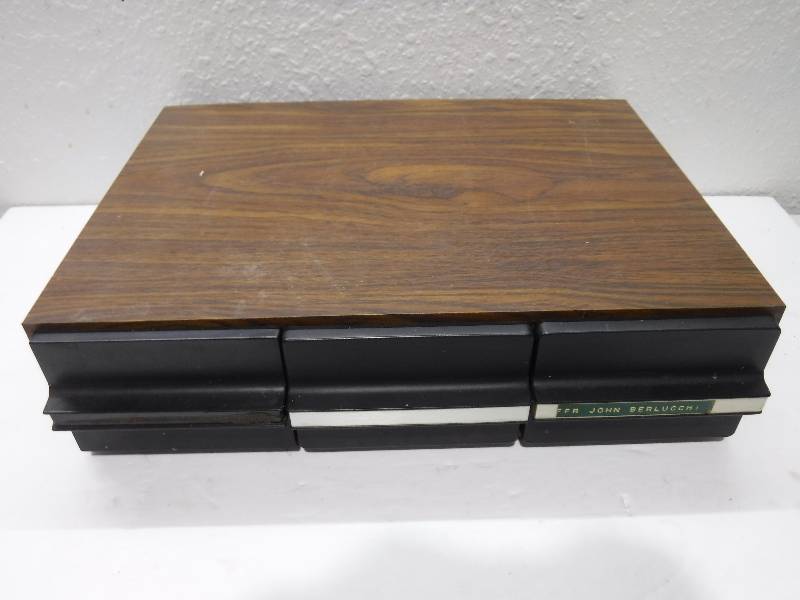 lot 7198 image: Cassette tapes and storage container