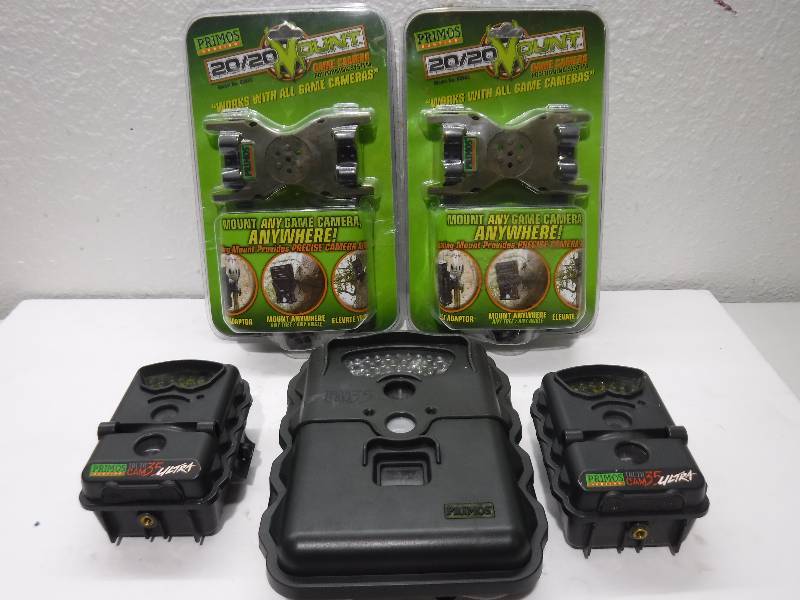 lot 7205 image: 3 trail cameras with mounting gear