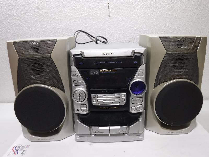 lot 7211 image: Sharp brand stereo system