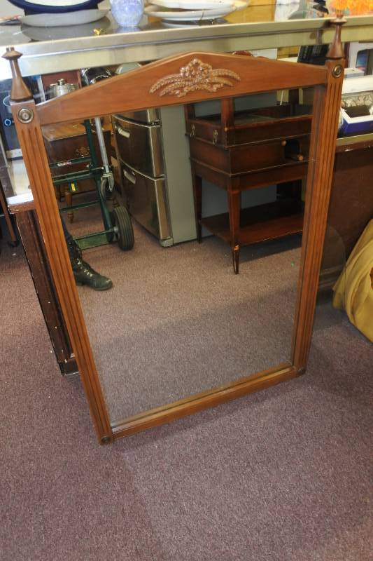 lot 1115 image: Wooden Mirror with Posts and Floral Carving in Center