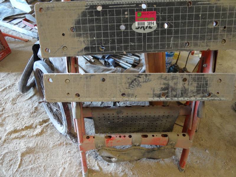 lot 3894 image: Skil Saw Table and Various small engines.