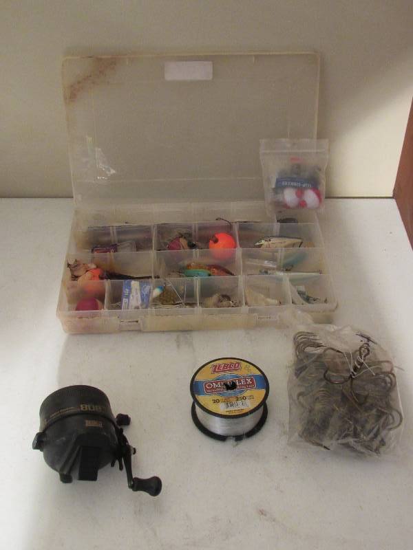 lot 5075 image: Assortment of Fishing Lures, 1 Zebco Reel, 1 Zebco 250lb Line