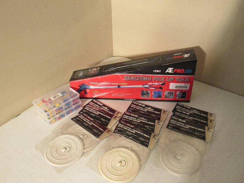 lot 5107 image: Pick Up Tool, Drain Stoppers & Stencils