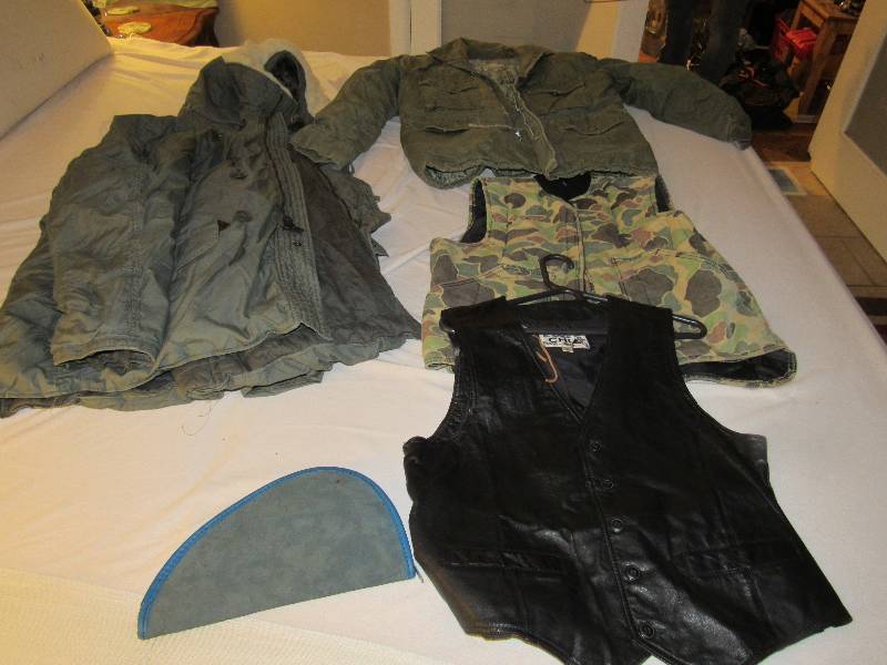 lot 5201 image: Jackets, vests and pistol case